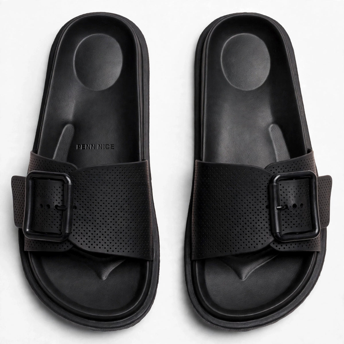 Black buckle slide sandals, top-down view of both slides