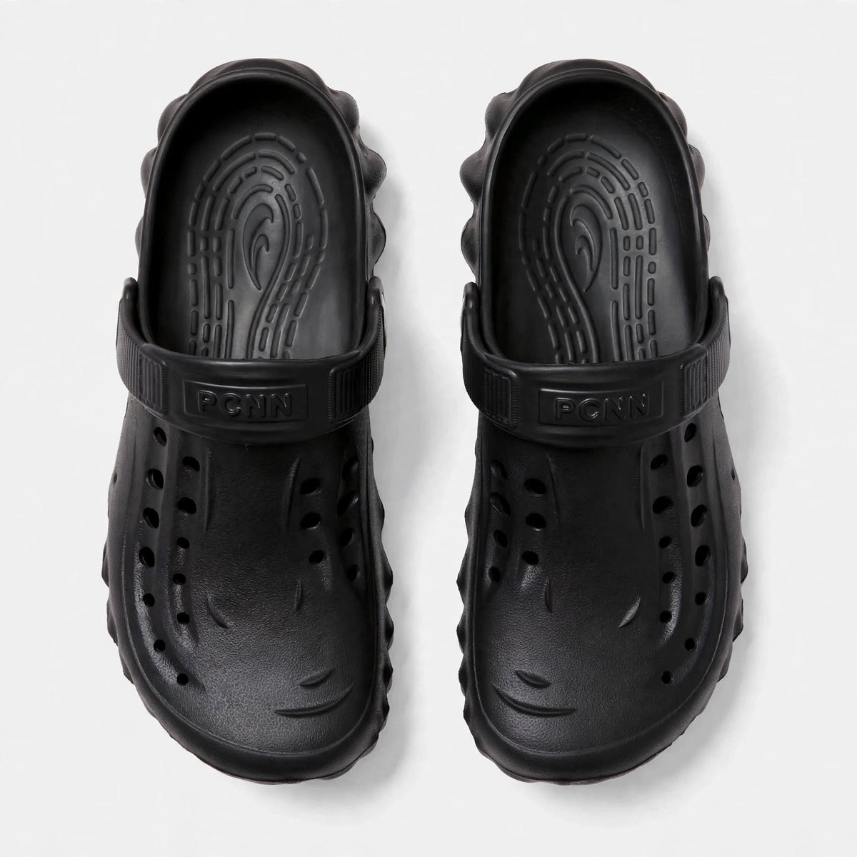 Men's black clogs - pair side angle view