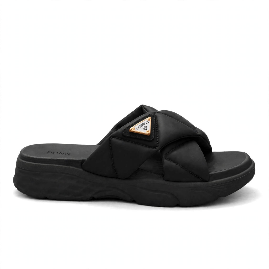 Black slide sandal, side profile view