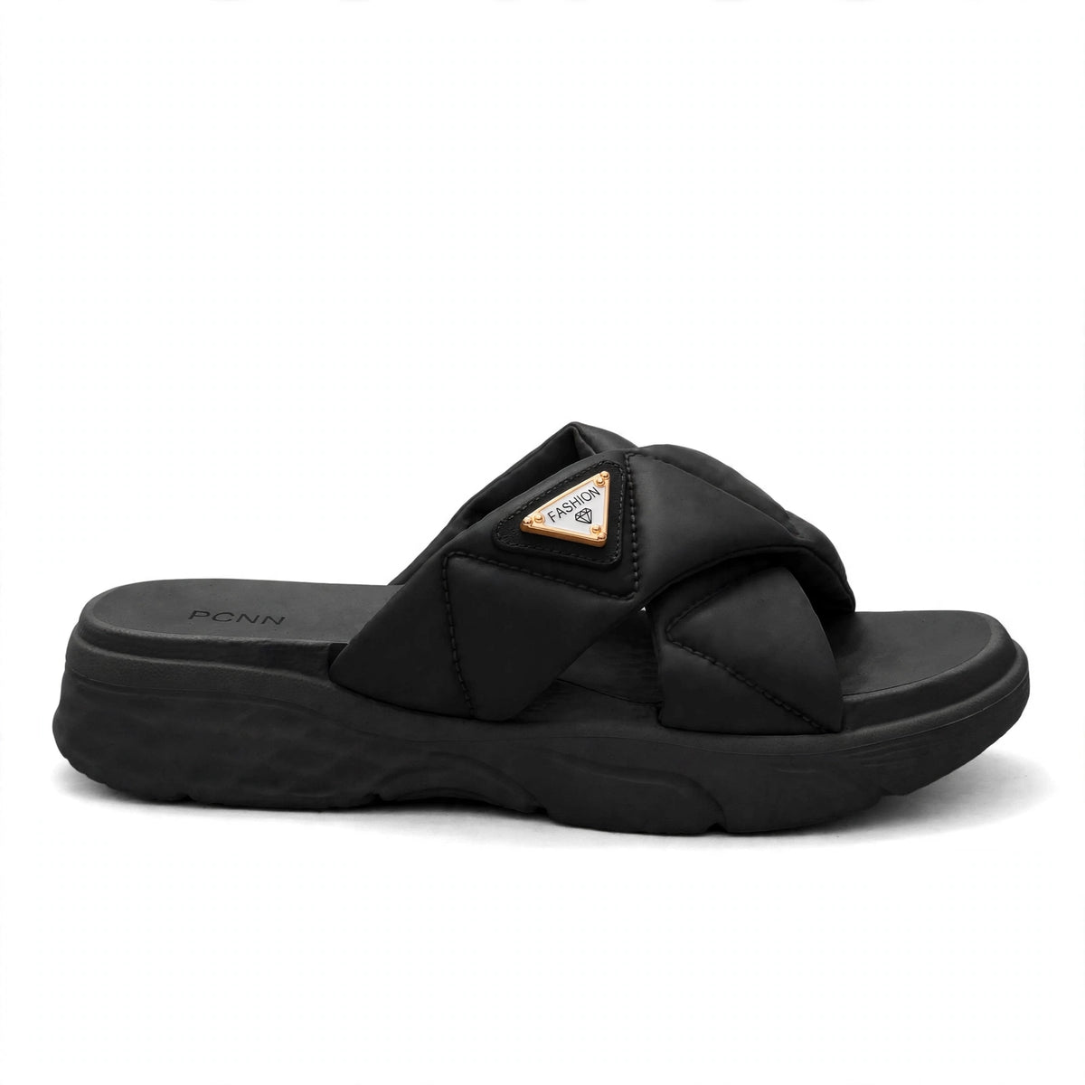 Black slide sandal, side profile view