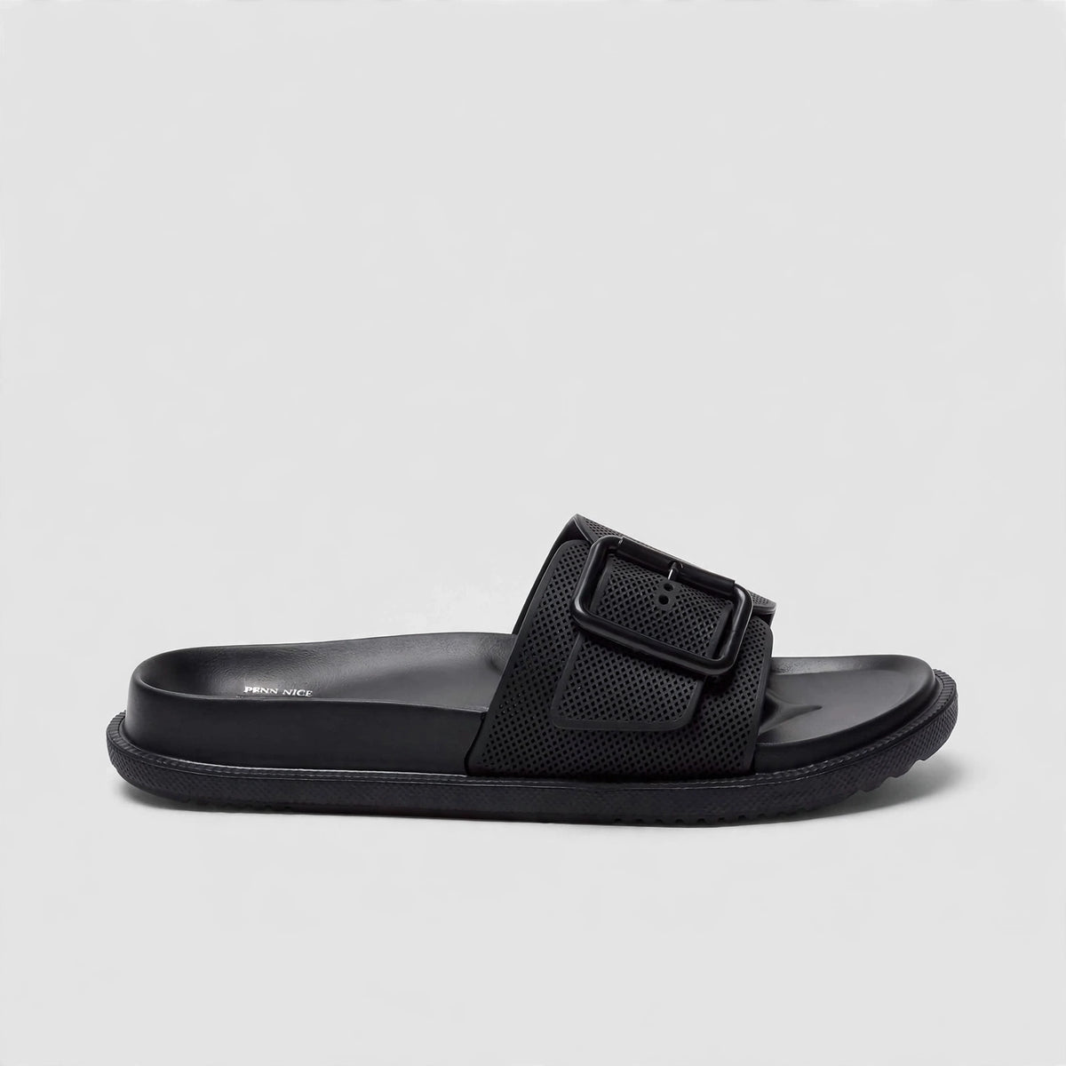 Black slide sandal, side profile view