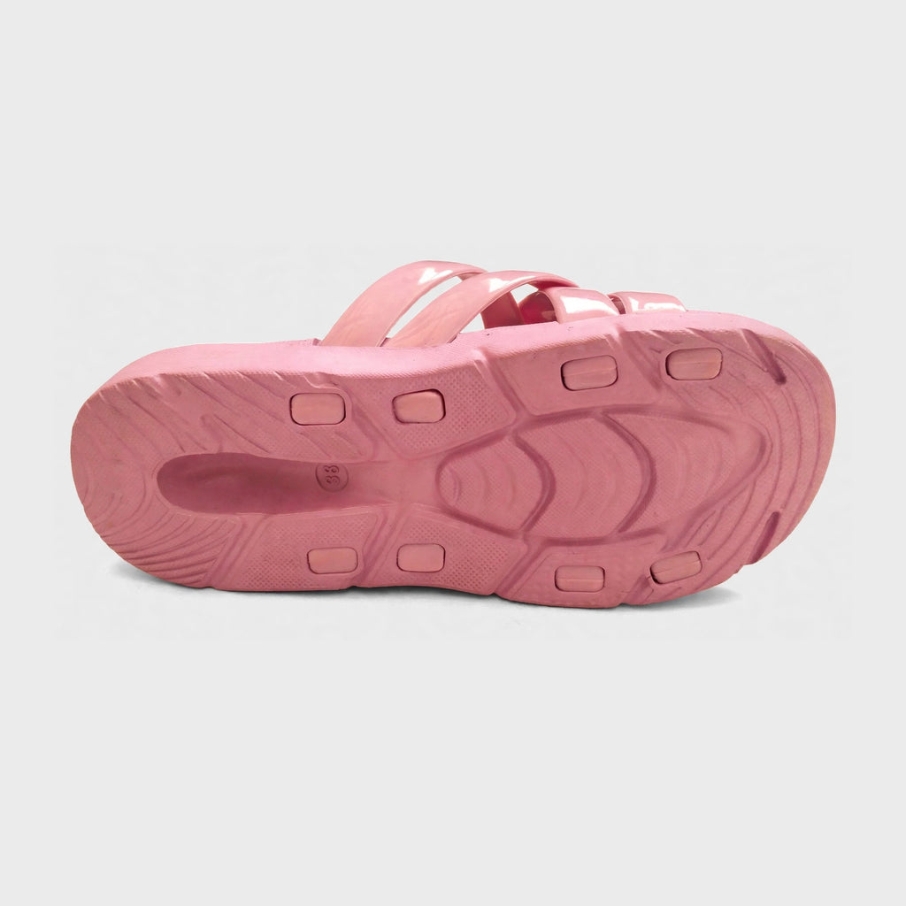 Dusty rose slide sandal outsole, bottom tread view