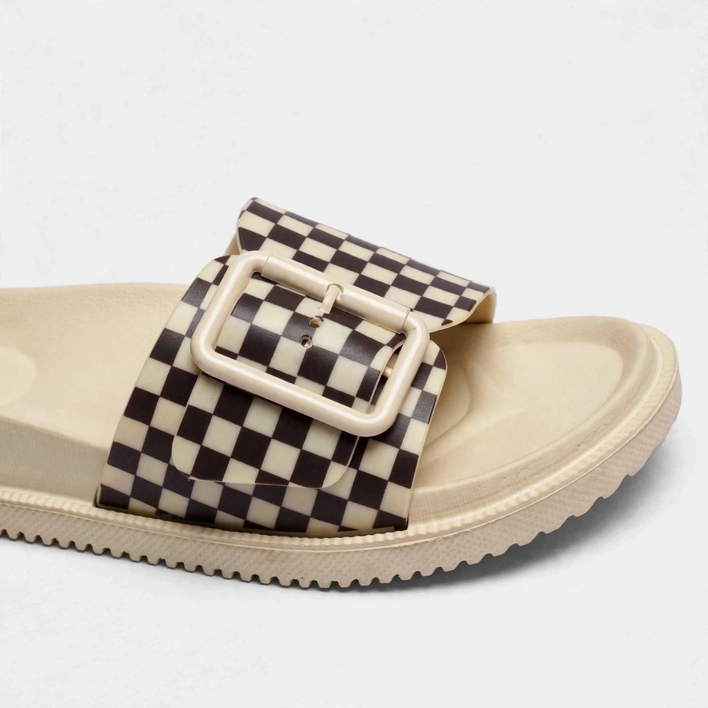 Cream slide sandal checkered sole close-up