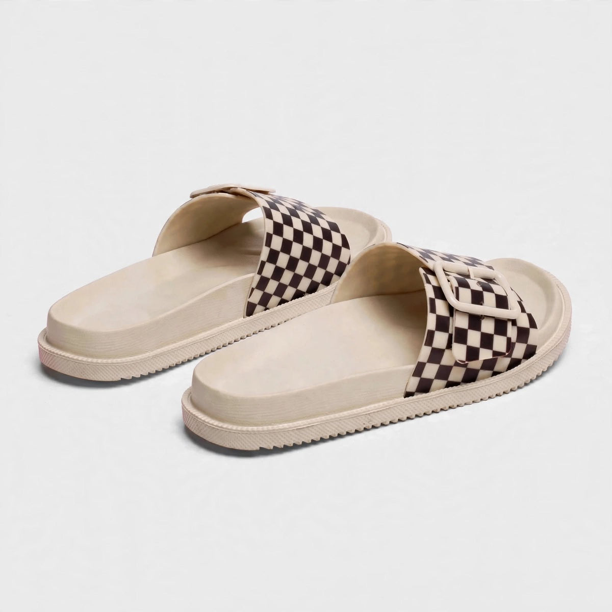 Cream slide sandals, rear view of pair