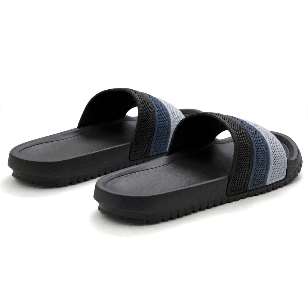 Black slide sandals, rear view of pair