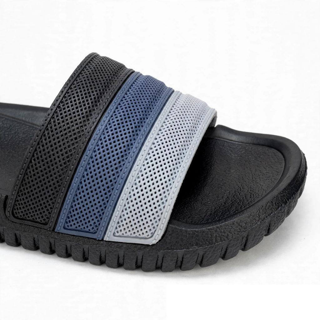 Black slide sandal buckle strap close-up