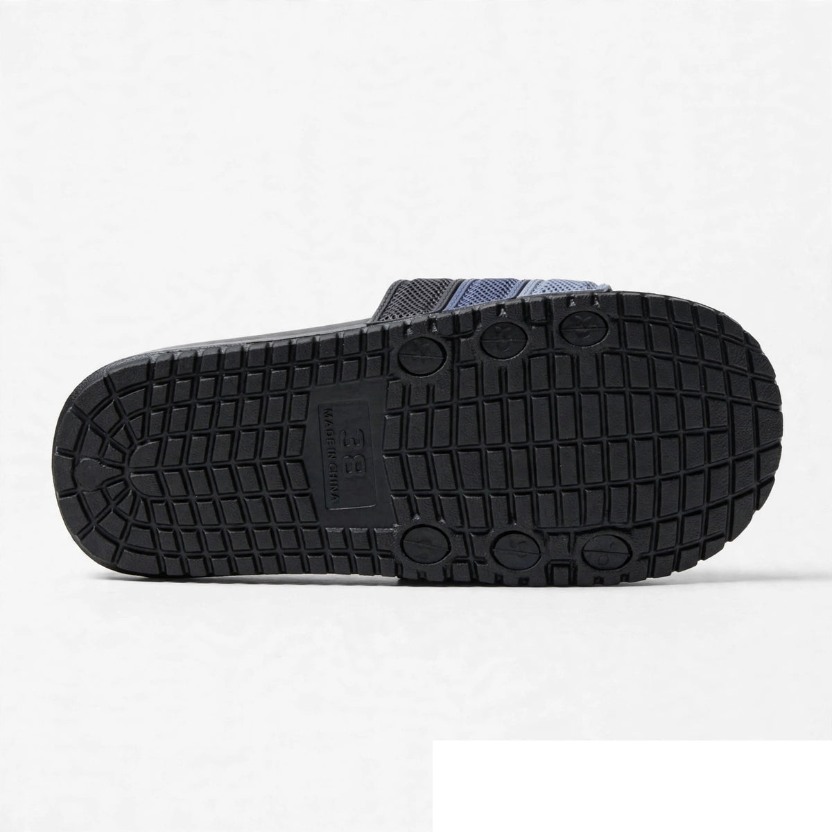 Black slide sandal outsole, flat bottom view