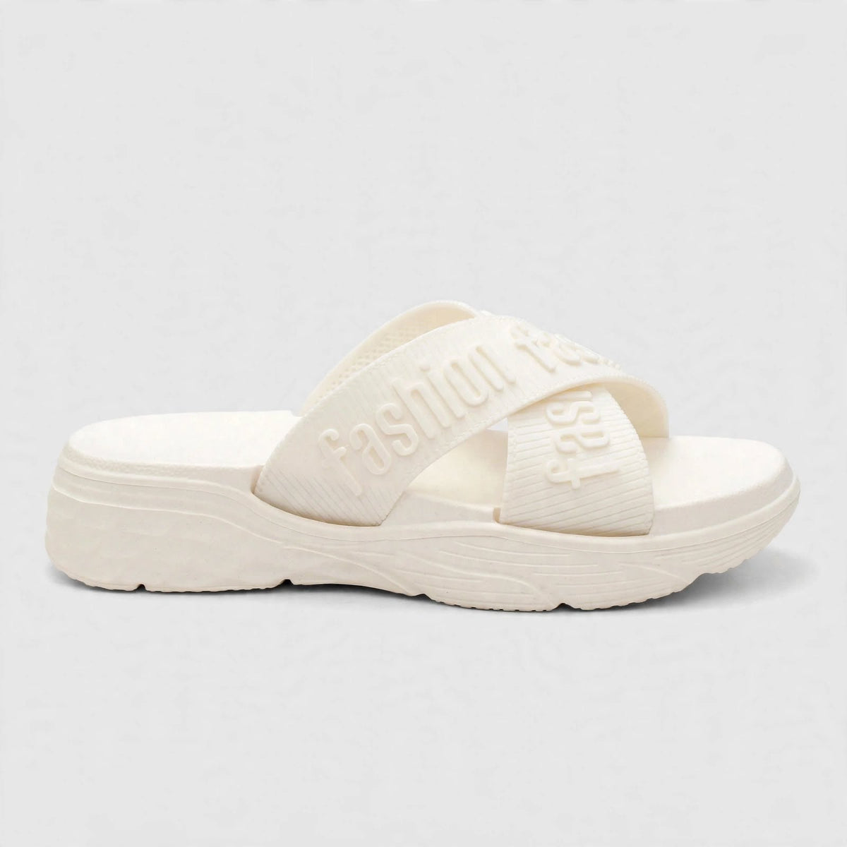 Ivory slide sandal showing cushioned footbed