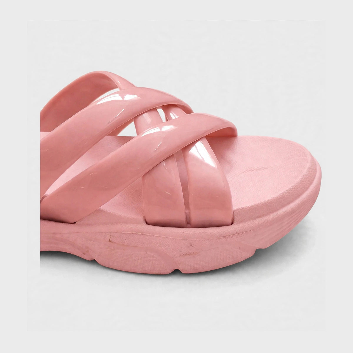 Dusty rose slide sandal buckle strap close-up