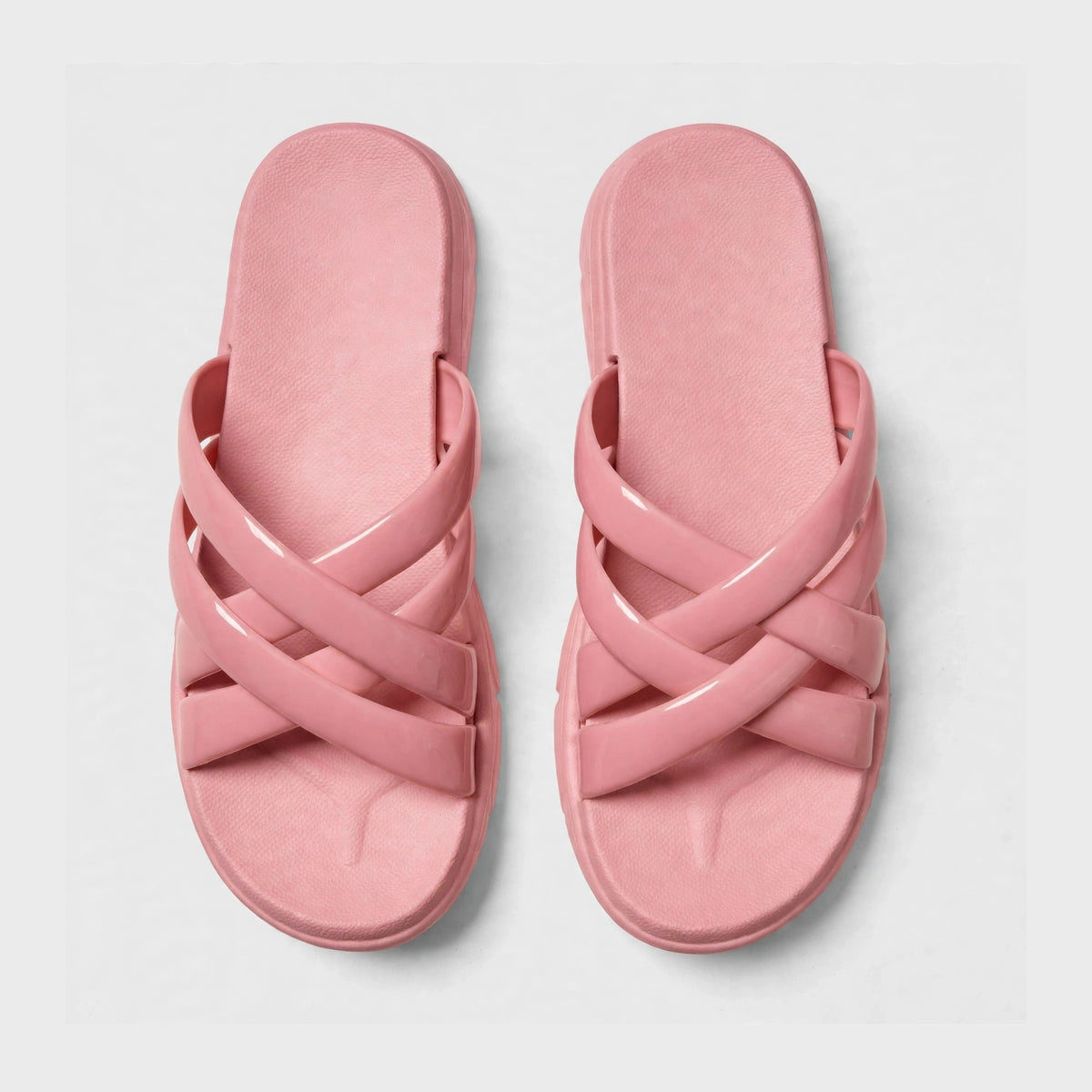 Dusty rose slide sandals shown as a pair