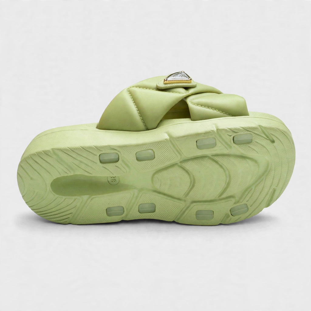 Green slide sandal outsole, bottom tread view