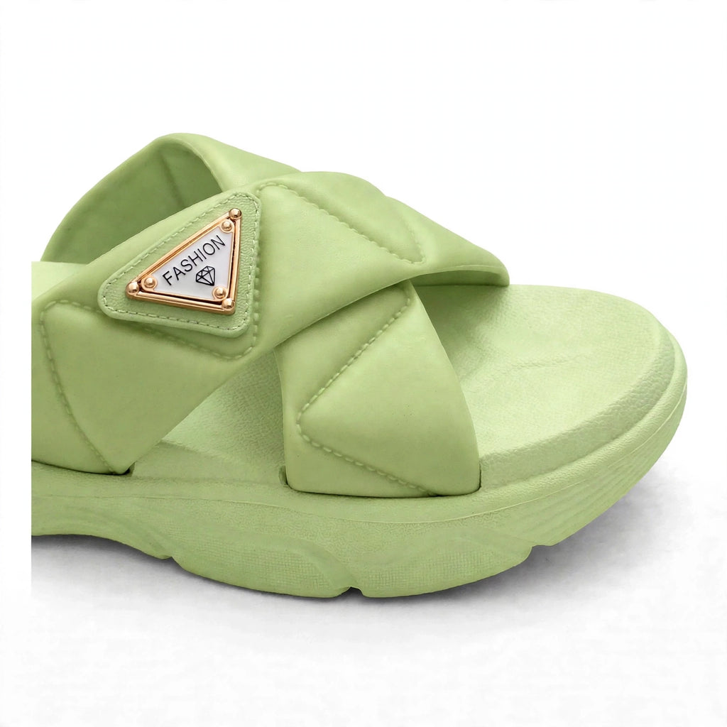Green slide sandal buckle strap close-up