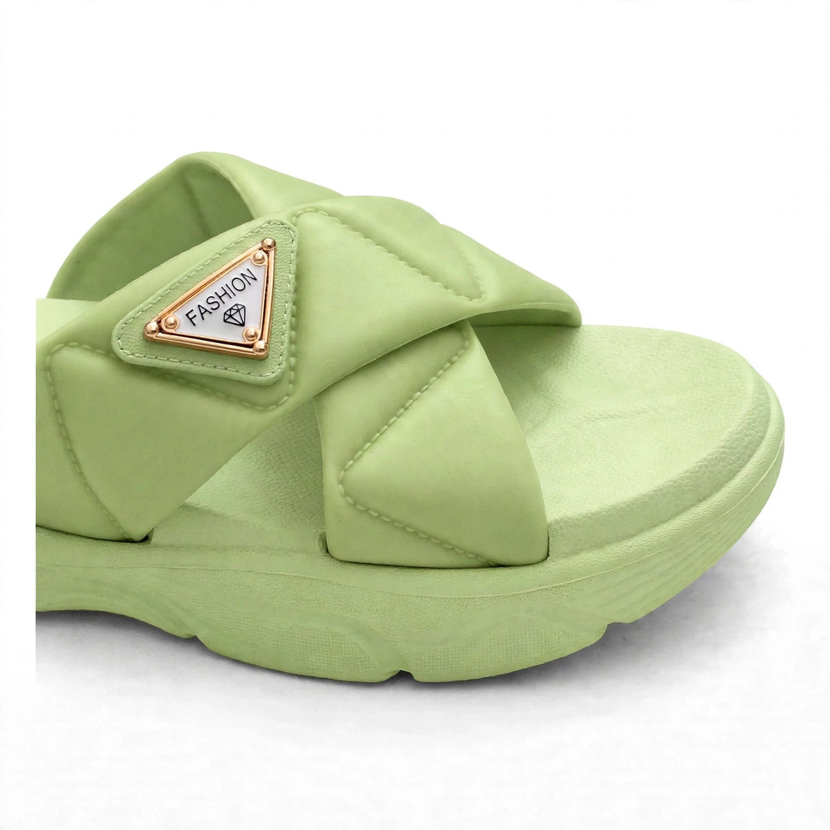 Green slide sandal buckle strap close-up