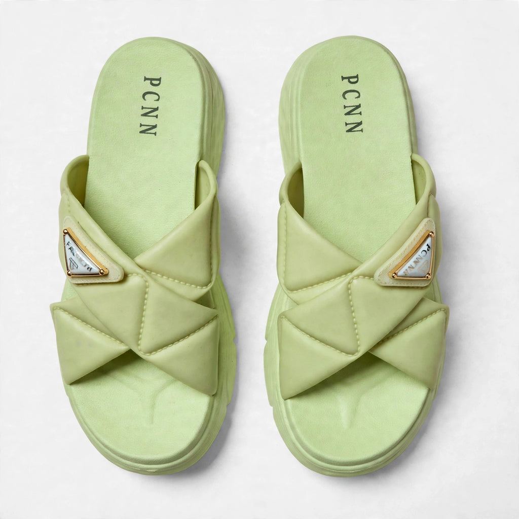 Green slide sandals, top-down view of both slides