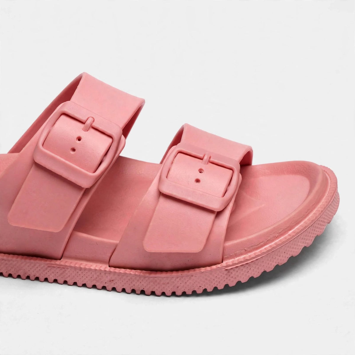 Pink double-buckle slide sandal, side profile