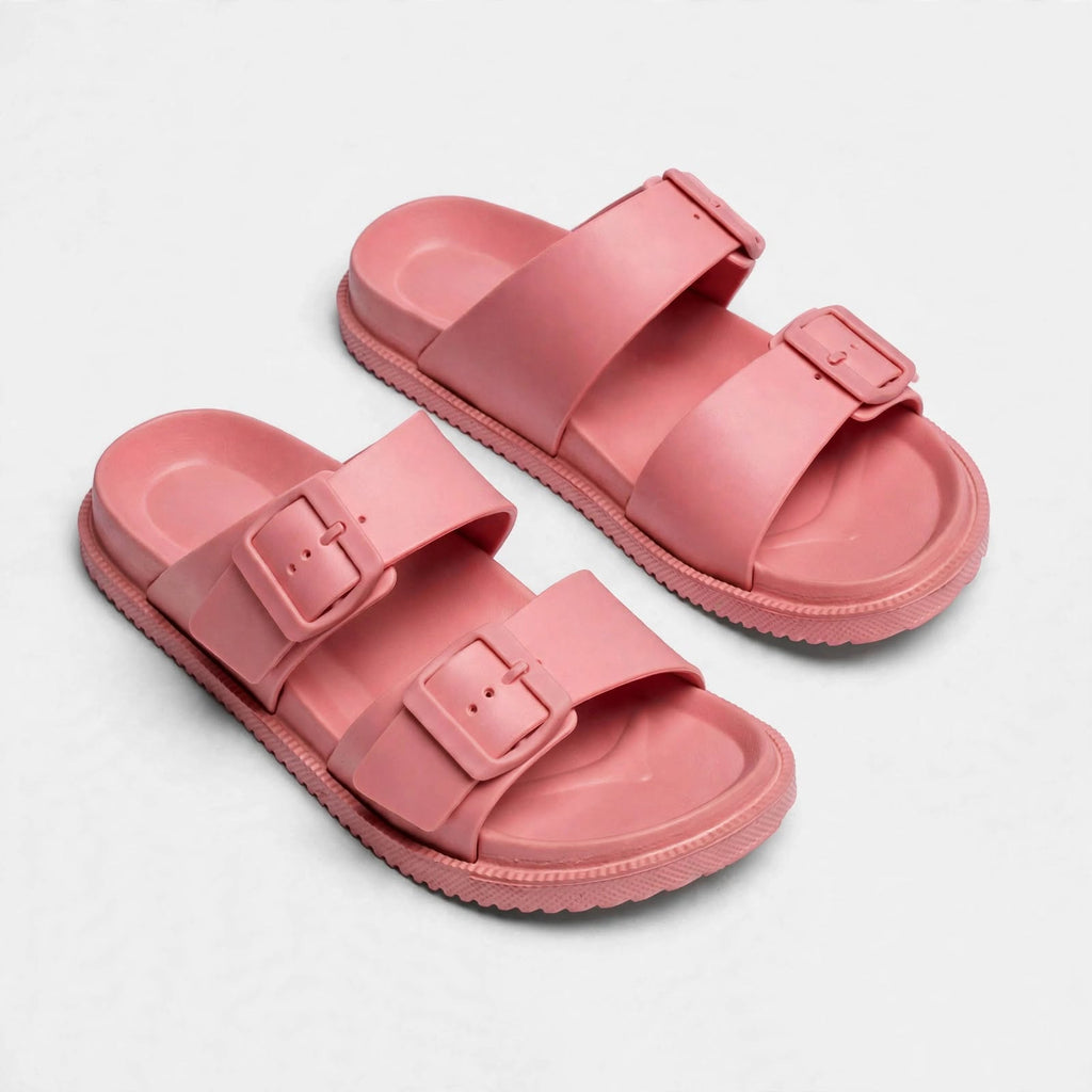 Pink double-buckle slide sandals, top-down view