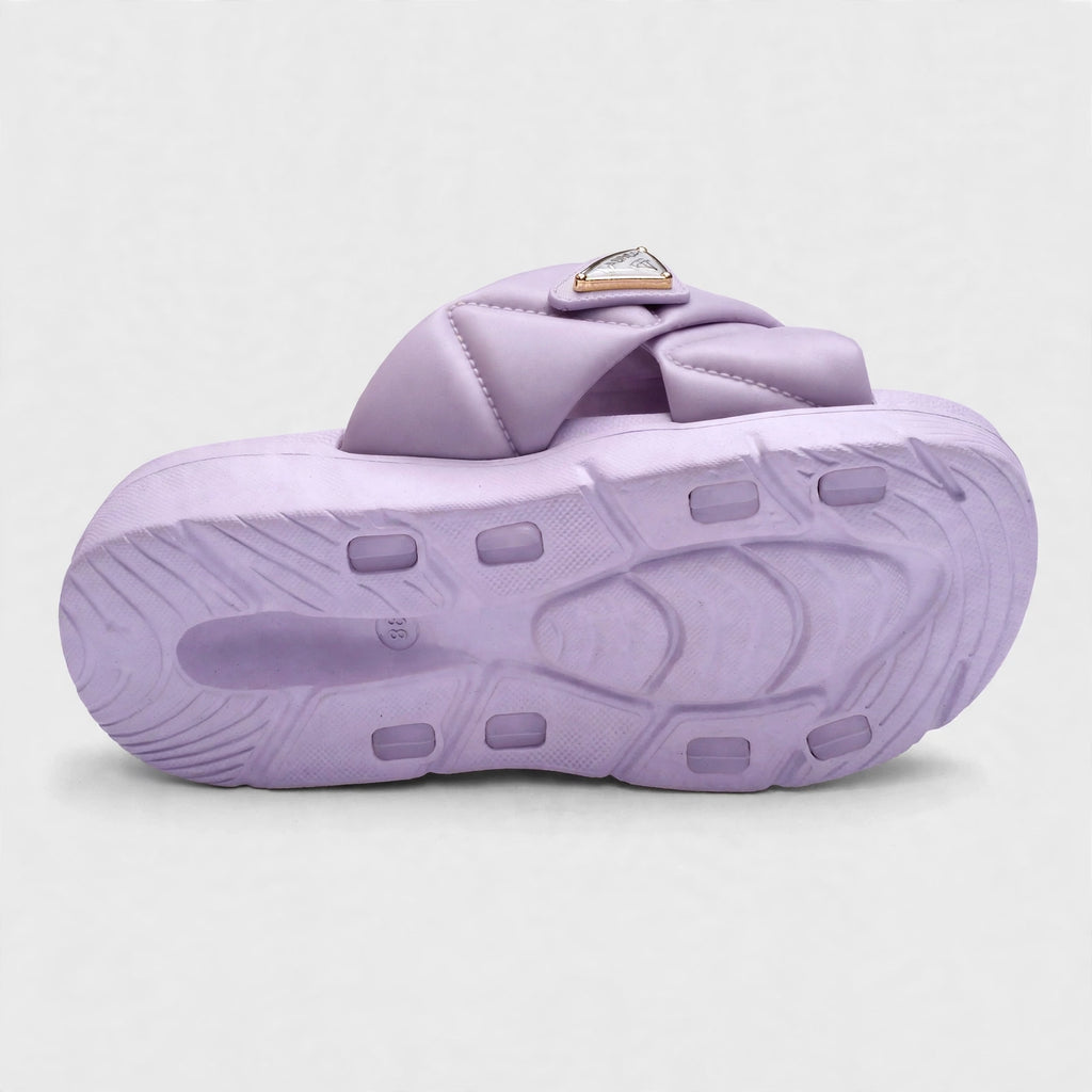 Purple slide sandal outsole, bottom tread view